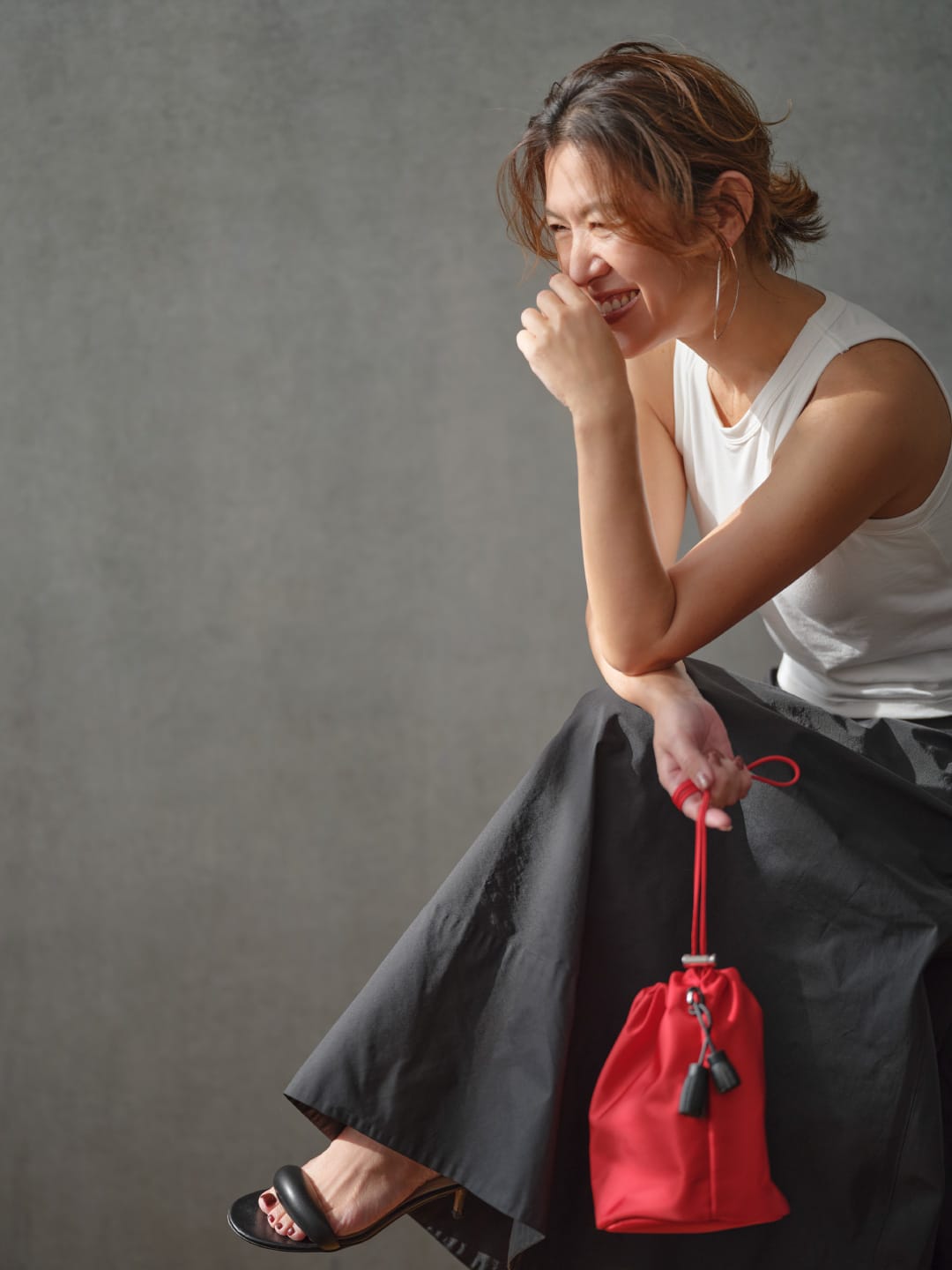 カジュアルだけで終わらない。振り幅の広いタンクトップ